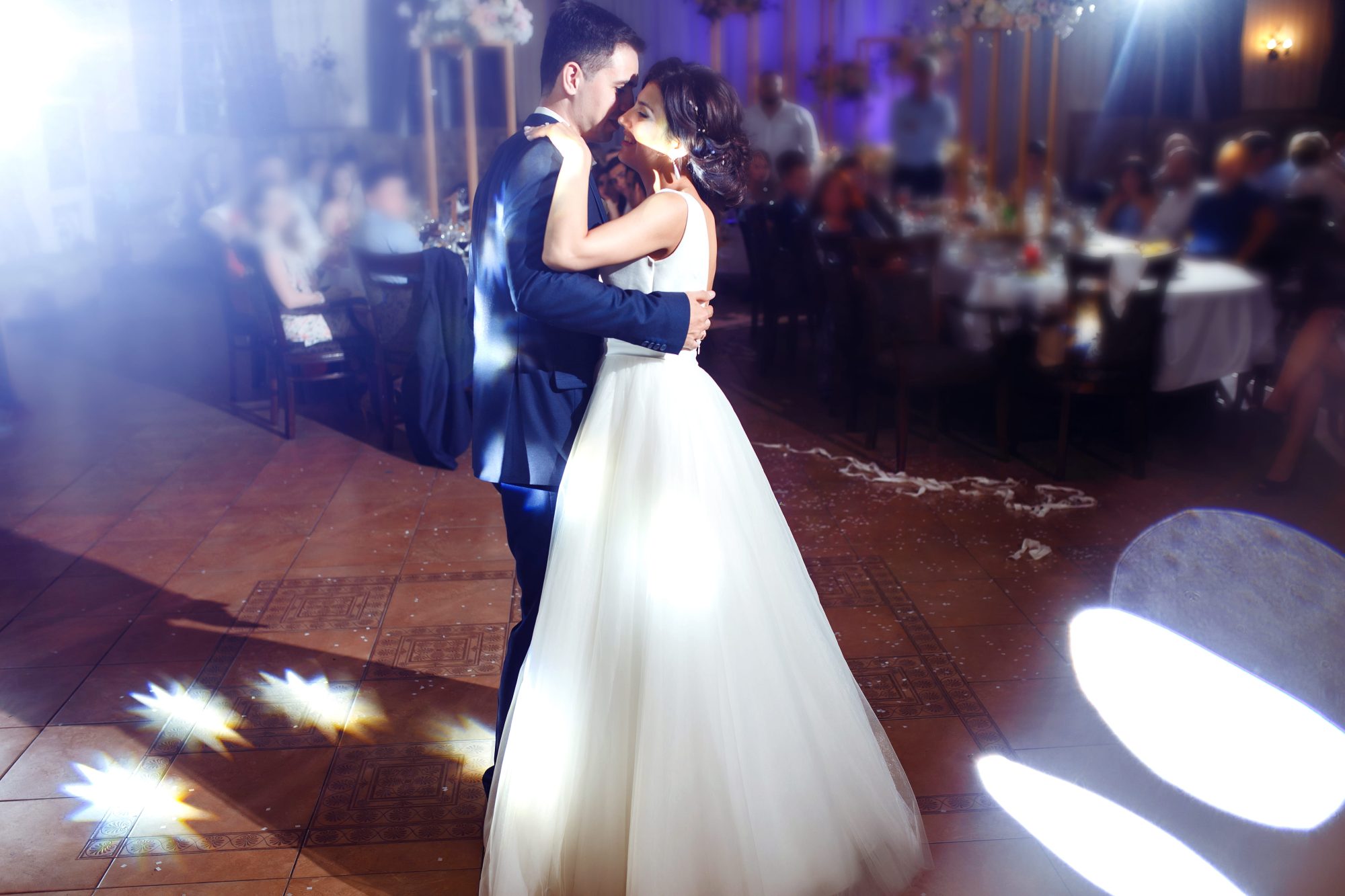 Wedding couple dancing during an evening celebration